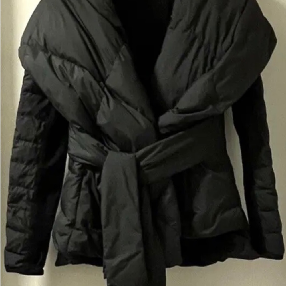 Lulu Lemon down jacket with hood and belt. New never worn. Feminine design.